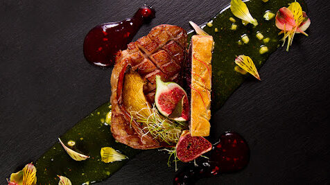 Gourmet duck dish with onion jam and figs