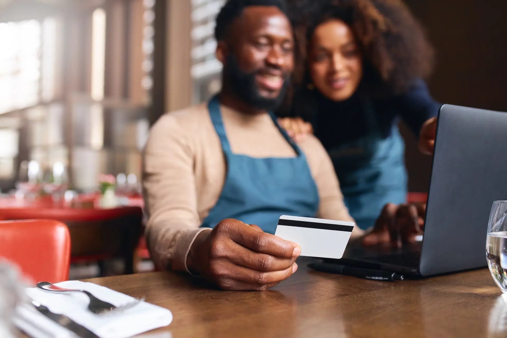 Restaurant owners working on finances